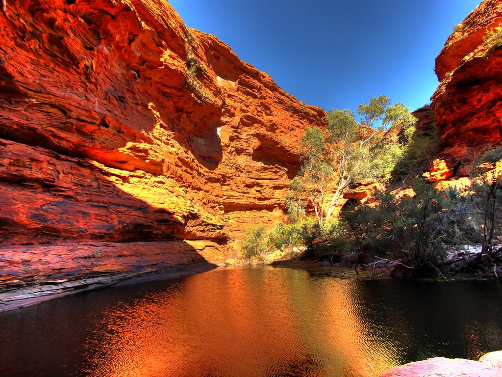 <span>2/50</span><h2>Kings Canyon, NT</h2><p>One of the best natural wonders in Australia is<a href="https://northernterritory.com/uluru-and-surrounds/destinations/kings-canyon-and-watarrka-national-park" target="_blank"> Kings Canyon </a>in the Northern Territory — a majestic land of 100m tall sandstone walls that tower over the desert. The spectacular area is also home to walking trails, 4WD tracks, a 6km Rim Walk and an array of accommodation options such as campsites and resorts. Visit the Lost City and the Garden of Eden for a trip into the ancient world. It's a must to stop here <a href="https://www.escape.com.au/destinations/australia/northern-territory/roadtripping-from-alice-springs-to-uluru/news-story/76a3c98e3925503b0c500dc10e7ad0d5" target="_blank" rel="noopener">when driving Alice Springs to Uluru</a>.</p>