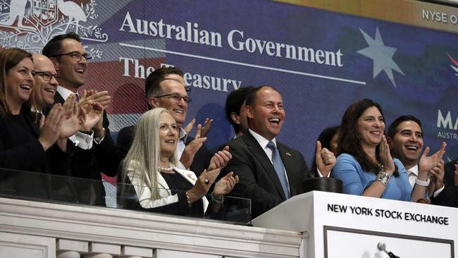 Treasurer Josh Frydenberg gives a thumbs-up as he rings the opening bell of the New York Stock Exchange on Wednesday. Picture: AP/Richard Drew