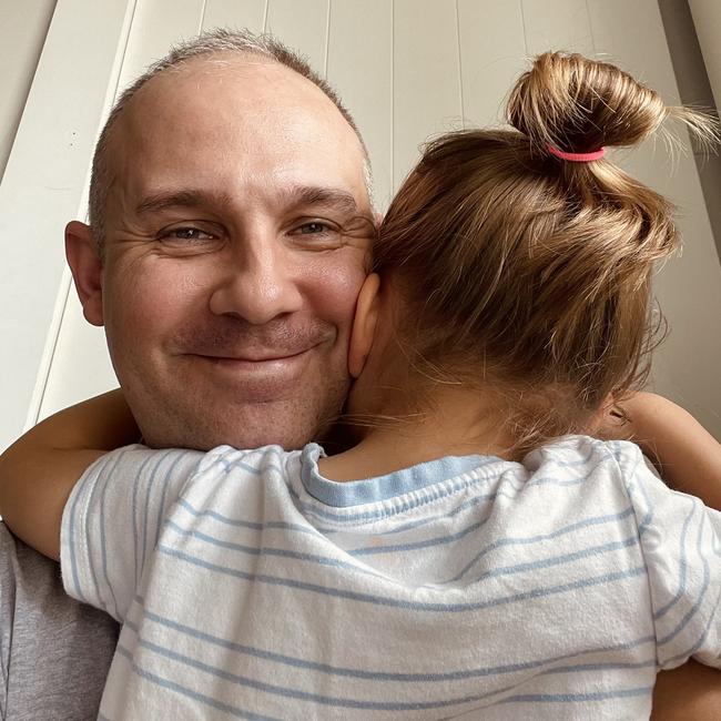 Arundel father Mark Morris with his son who he has removed from a prestigious private school after being ordered to cut the boy’s hair. Picture: Supplied