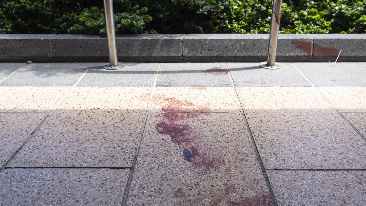 The intersection of Ruthven and Russell Sts in the Toowoomba CBD where a person was assaulted, unconfirmed blood stains are seen on the pavement, Sunday, November 24, 2024.