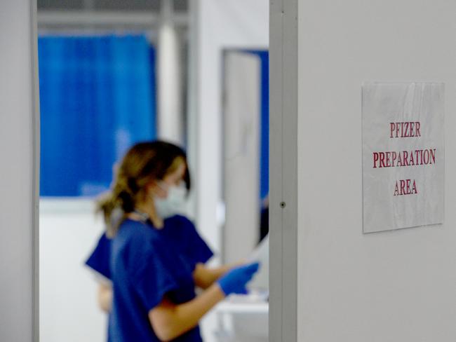 MELBOURNE, AUSTRALIA - NewsWire Photos MAY 28, 2021: Medical staff at the Melbourne Convention and Exhibition Centre prepare to administer COVID vaccinations. Picture: NCA NewsWire / Andrew Henshaw