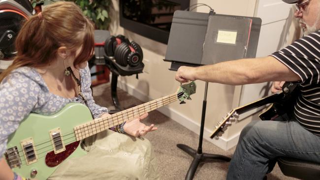 Birdie took a bass guitar lesson after school. Picture: Sarah Blesener for WSJ