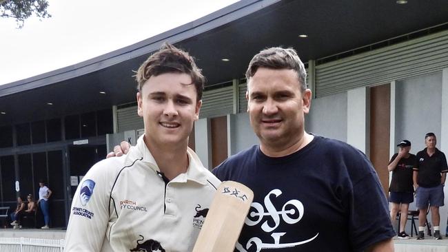 Tyran and his rugby league playing father Glen Liddiard. Pic: Barry Clarence