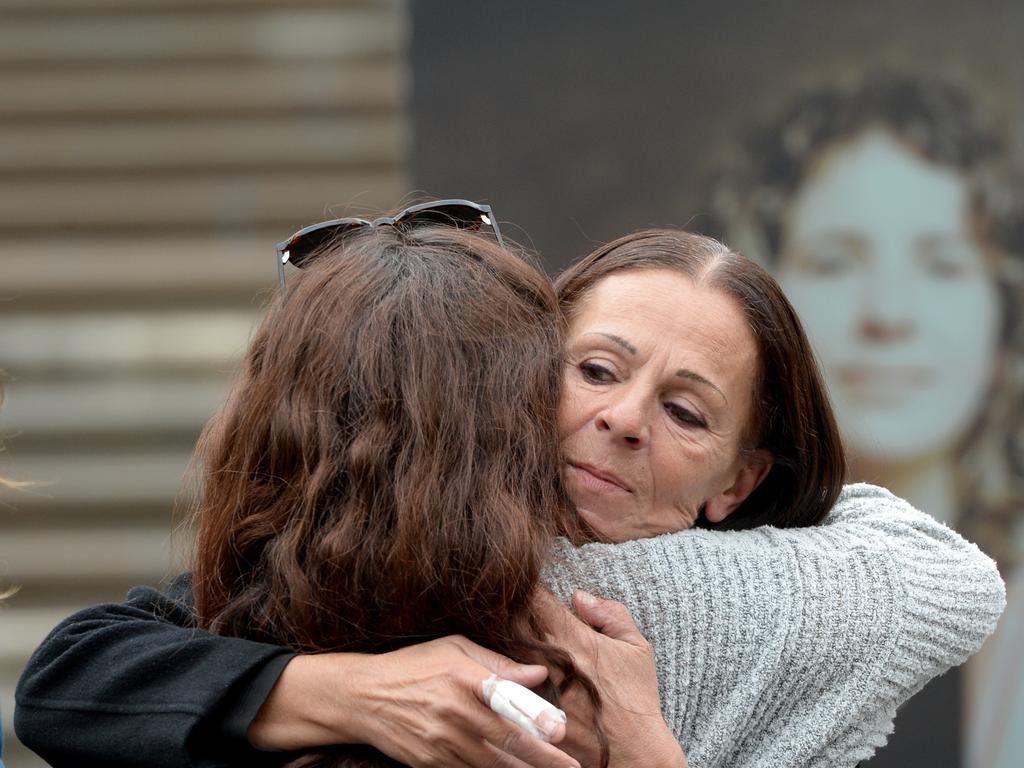 Ms Di Mauro is comforted by supporters at a rally outside Parliament House in Melbourne. Picture: NCA NewsWire / Andrew Henshaw