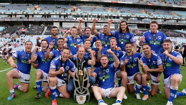 It doesn’t get better this! Greg Matterson and team after winning the 2019 NRL State Championship in the most dramatic of circumstances. Picture: Mike Magee