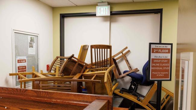 A door is barricaded against possible police entry as pro-Palestinian demonstrators occupied the Millar Library on the campus of Portland State University. (Photo by John Rudoff / AFP)