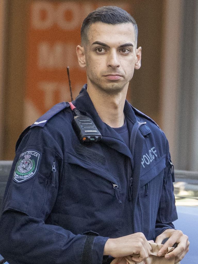 NSW Police officer Beau Lamarre-Condon handed himself into Bondi Police Station on Friday.