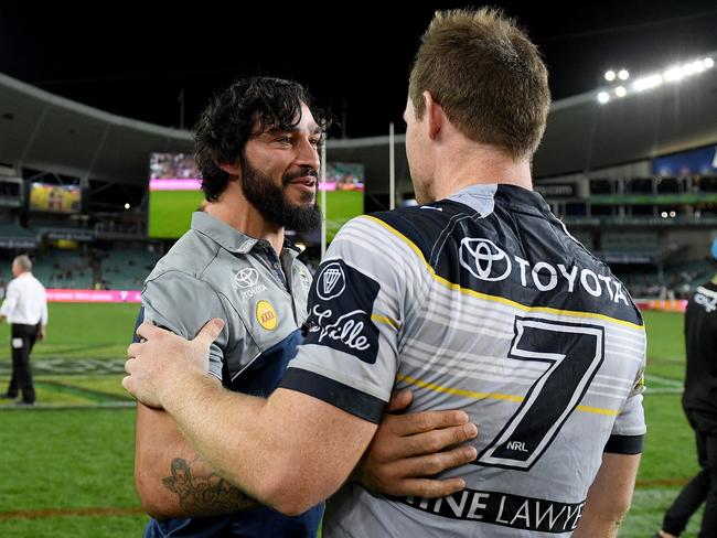 Jonathan Thurston congratulates Michael Morgan.