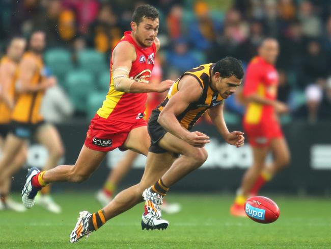 The moment Hawthorn supporters dreaded. Cyril Rioli injures his hamstring against Gold Coast.