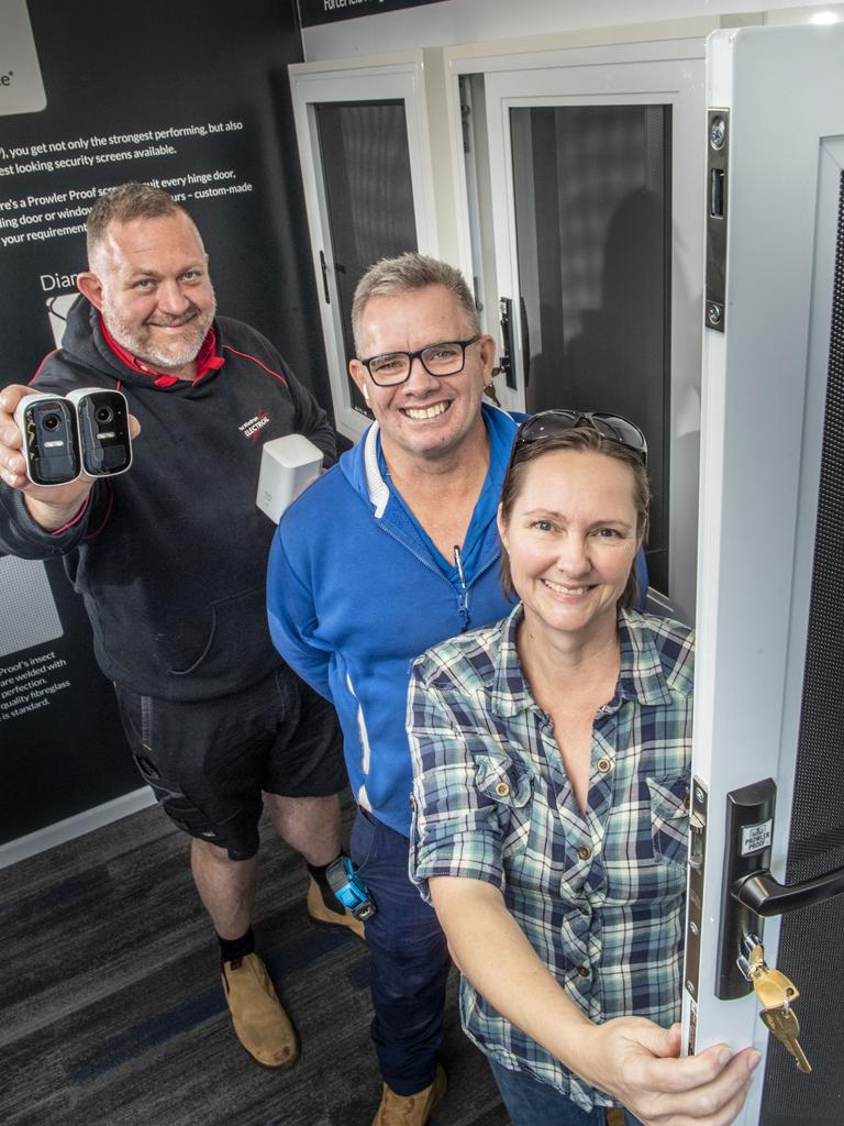 (from left) Paul Wiedman from Paul Wiedman Electrical, Robbie Hawkswell from Platinum Glass and Security and Kelly Skowronski are on a path to help a victim of crime. Tuesday, May 31, 2022. Picture: Nev Madsen.