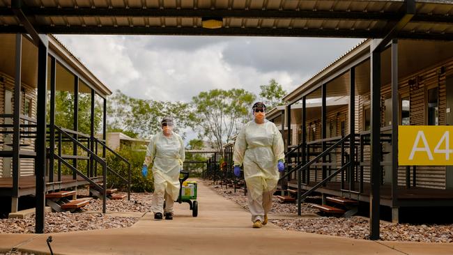 A swabbing team in the Howard Springs quarantine facility. Picture: Glenn Campbell