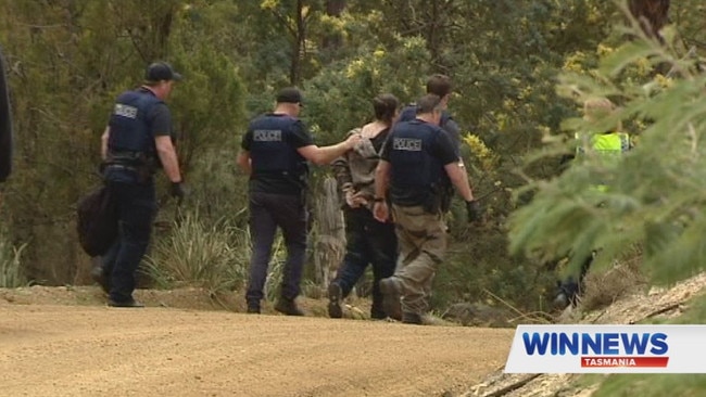 Police take Graham John Enniss back into custody. Picture: WIN NEWS