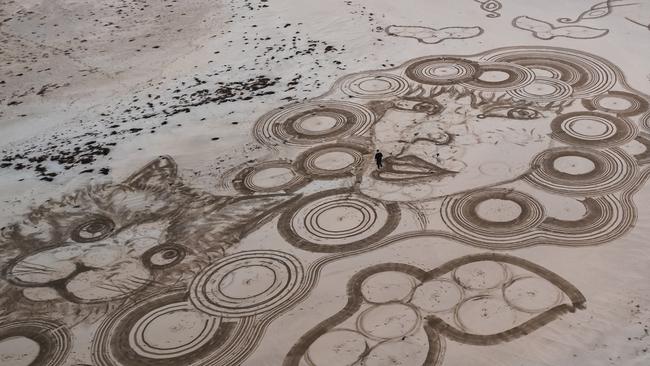 The art lasted on the beach for two hours before being washed away. Picture: James Anderson/Turbo360.au