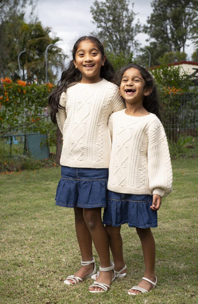 Kopika, 7, and Tharnicaa, 5, at their home in Biloela. Picture: Russell Shakespeare