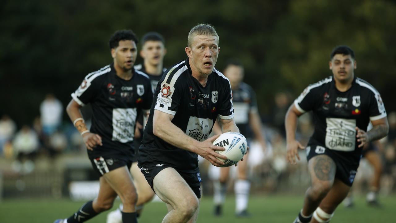 Redfern's Jay Belgrove with the ball. Picture: John Appleyard