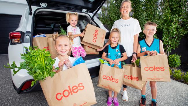 Coles are discontinuing plastic bags, a move mum Hayley Ward says will help her kids Poppy, 6, Stella, 4, Maisie, 8, Jobe, 9, think more about sustainability. Picture: Rebecca Michael