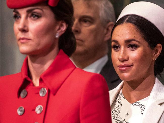 Britain's Meghan, Duchess of Sussex (R) and Britain's Catherine, Duchess of Cambridge, (L) attend the Commonwealth Day service at Westminster Abbey in London on March 11, 2019. - Britain's Queen Elizabeth II has been the Head of the Commonwealth throughout her reign. Organised by the Royal Commonwealth Society, the Service is the largest annual inter-faith gathering in the United Kingdom. (Photo by Richard Pohle / POOL / AFP)