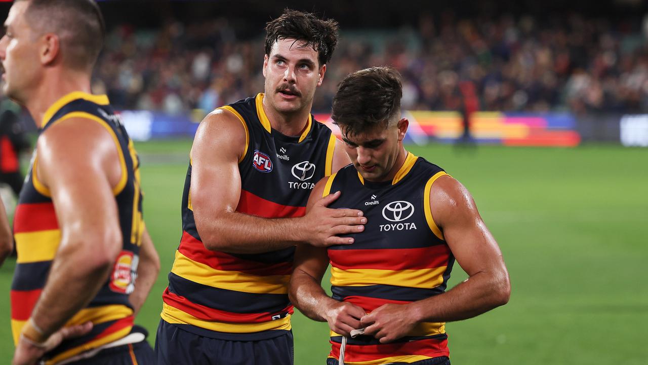 ADELAIDE, AUSTRALIA - APRIL 19: Darcy Fogarty and Josh Rachele of the Crows after their loss during the 2024 AFL Round 06 match between the Adelaide Crows and the Essendon Bombers at Adelaide Oval on April 19, 2024 in Adelaide, Australia. (Photo by James Elsby/AFL Photos via Getty Images)