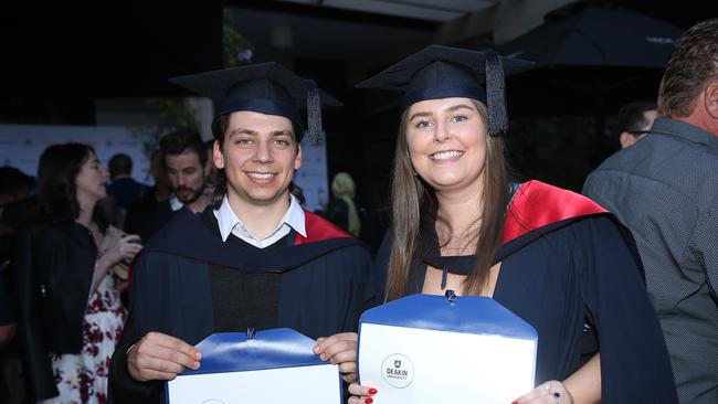 Daniel Hill and Skyler Jordan celebrate graduation. Picture: Alan Barber