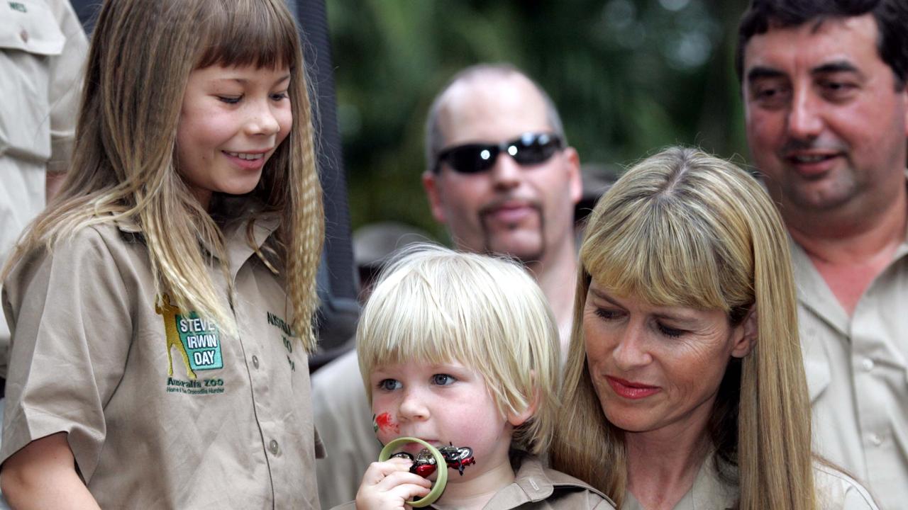Young Bindi, Robert and mum Terri at Steve Irwin Day at Australia Zoo the year after his death.