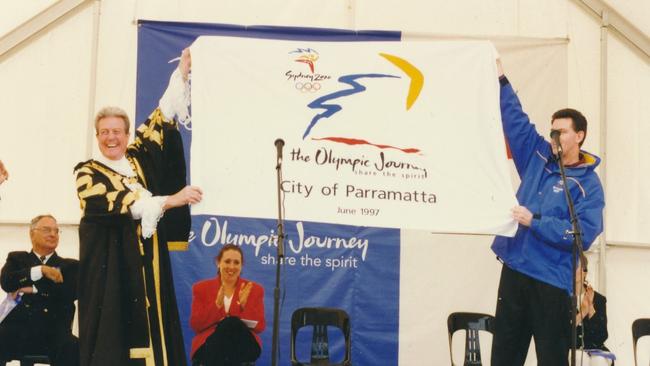 Parramatta Lord Mayor John Books (left) at the Olympic Journey Parade in Parramatta in 1997. Picture: City of Parramatta