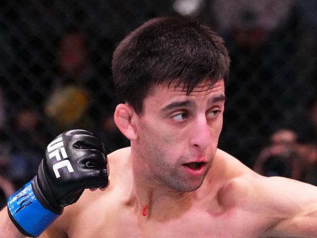 LAS VEGAS, NEVADA - MARCH 02: (L-R) Steve Erceg of Australia punches Matt Schnell in a flyweight bout during the UFC Fight Night event at UFC APEX on March 02, 2024 in Las Vegas, Nevada. (Photo by Jeff Bottari/Zuffa LLC via Getty Images)