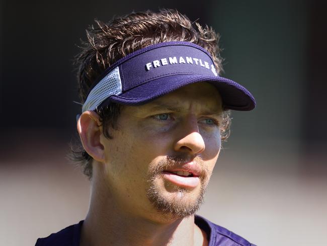 PERTH, AUSTRALIA - JANUARY 12: Nat Fyfe looks on during a Fremantle Dockers AFL training session at Fremantle Oval on January 12, 2022 in Perth, Australia. (Photo by Paul Kane/Getty Images)