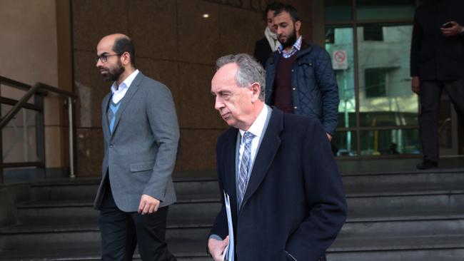 Forensic Pathologist Stephen Cordner leaves the Melbourne Magistrates Court after giving evidence in Melbourne. Picture: AAP