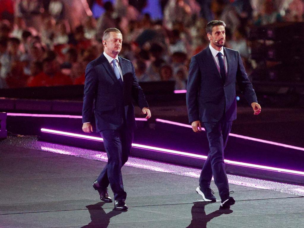 From left, International Paralympic Committee (IPC) president Andrew Parsons and Paris 2024 Olympics and Paralympics Organising Committee (COJO) president Tony Estanguet walk on stage during the ceremony. Picture: Geoffroy Van Der Hasselt./AFP