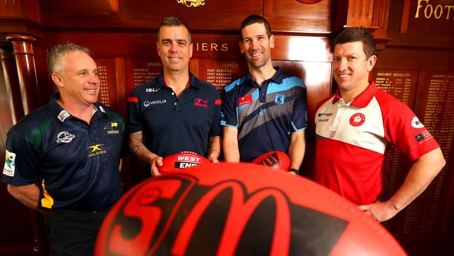 Departing Eagles coach Michael Godden with Norwood Jarrod Cotton, Sturt Martin Mattner and North Adelaide Josh Carr during the finals season. Picture: Tait Schmaal