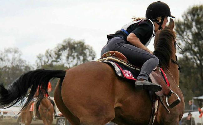 Elyce Smith from Zone 27 (Rockhampton), gets back on her horse in style during the stepping stones round of the junior mounted games competition at the Morgan Park Polocrosse fields on Saturday. Picture: Erin Smith