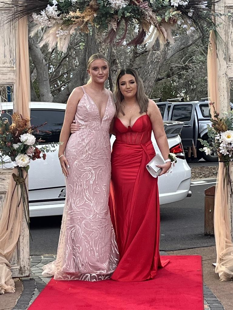 Tara Singleton and Chelsea Kingdon arrive at the Hervey Bay State High School formal.