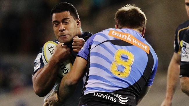 CANBERRA, AUSTRALIA - JULY 11: Scott Sio of the Brumbies is tackled during the round 19 Super Rugby match between the Brumbies and the Force at Canberra Stadium on July 11, 2014 in Canberra, Australia. (Photo by Stefan Postles/Getty Images)