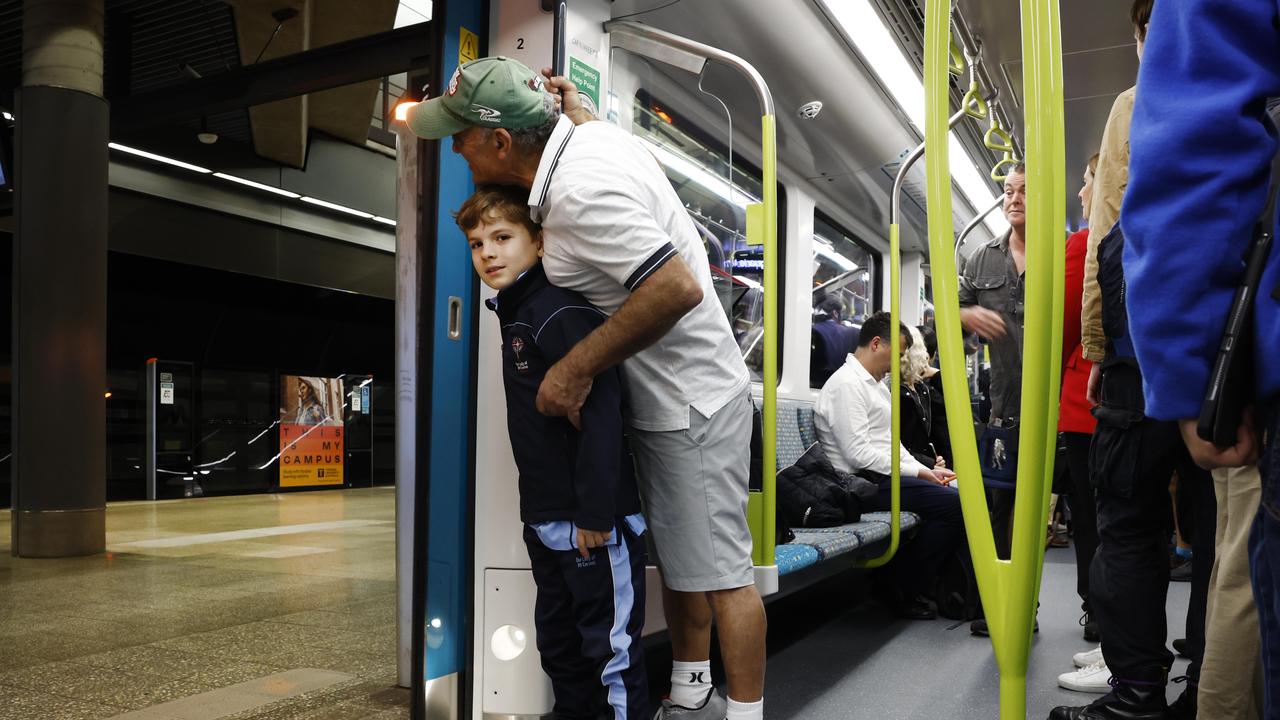 Pictured is on a Sydney Metro carriage is Adam Riakos and his grandfather Mosh Riakos. They were among the first passengers on the brand new Sydney Metro on its maiden run to Tallawong at 4.54am. Picture: Richard Dobson