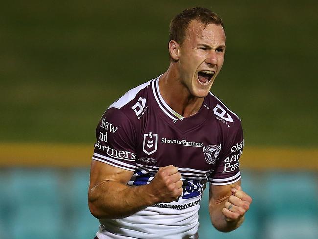 SYDNEY, AUSTRALIA - MARCH 21: Daly Cherry-Evans of the Sea Eagles celebrates kicking the match winning field goal during the round 2 NRL match between the Sydney Roosters and the Manly Sea Eagles at Leichhardt Oval on March 21, 2020 in Sydney, Australia. (Photo by Jason McCawley/Getty Images)