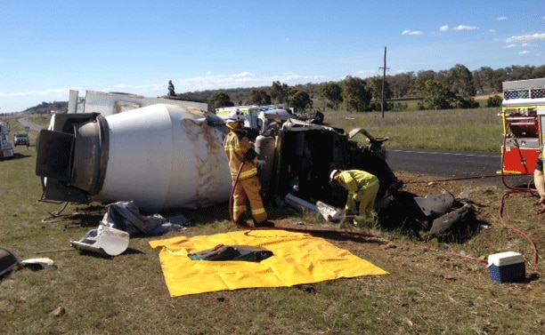 Emergency services at the scene of a truck crash on the Warrego Hwy east of Oakey.