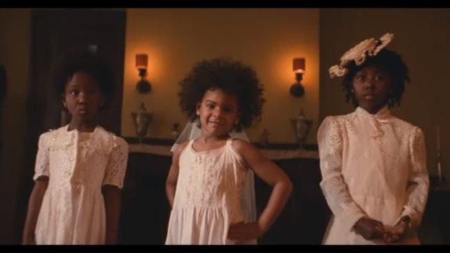 Beyonce and Jay Z’s daughter Blue Ivy (centre) features in a shot in the clip. Picture: YouTube.