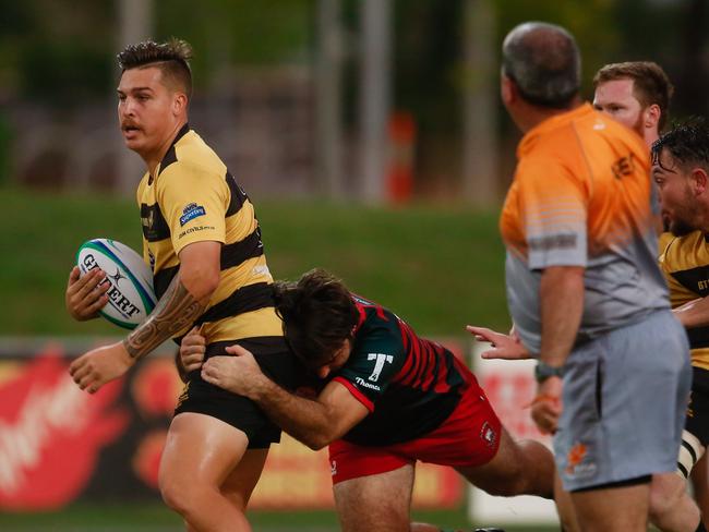 Brayden Cunningham (ball )  as Darwin Dragons V South Darwin in a GrandFinal repeat.Picture GLENN CAMPBELL