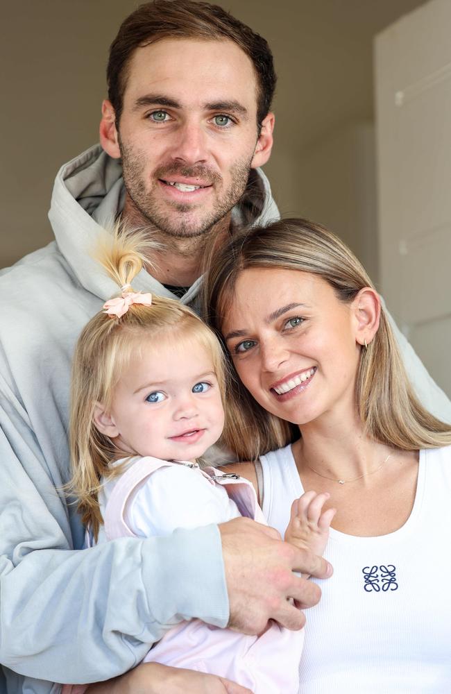 Kellie Finlayson with her husband Jeremy and daughter Sophia. Picture: Russell Millard