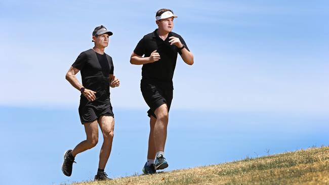 Ross Kingsley, physical education trainer of 22 years and founder of running club RK Pod, training his 13 year old son, Hudson Kingsley at Pizzey Park ahead of Project GRIT. Picture Glenn Hampson