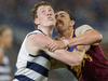 BRISBANE, AUSTRALIA - APRIL 20: Toby Conway of the Cats and Joe Daniher of the Lions in action during the 2024 AFL Round 06 match between the Brisbane Lions and the Geelong Cats at The Gabba on April 20, 2024 in BRISBANE, Australia. (Photo by Russell Freeman/AFL Photos via Getty Images)