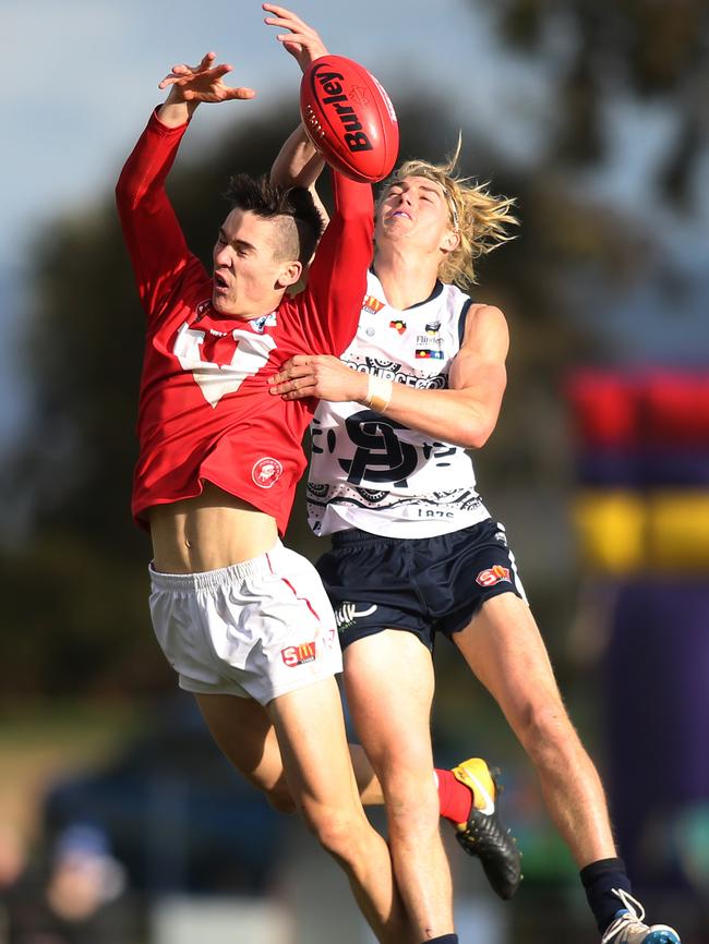 South's Jaidan Kappler spoils North's Connor Rozee at Noarlunga Oval.  Picture: AAP Image/Dean Martin