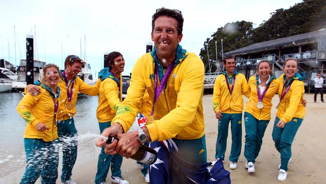 Sailors celebrate after their record haul at the London Olympics.