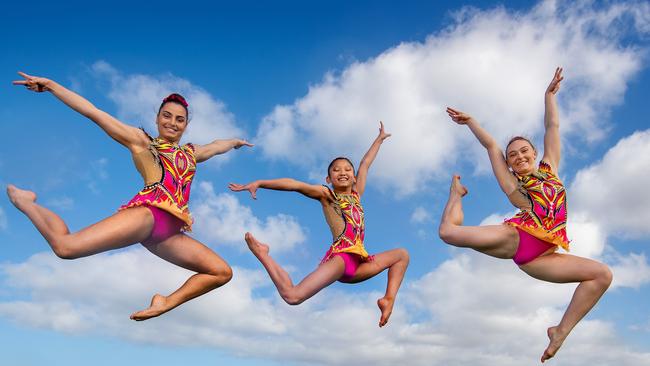 Victoria’s Team Adrenalin — Kirsty Faulkner (25), Kathy Le (11) and Emily Massara (16) — in flight at Williamstown. Picture: Jay Town