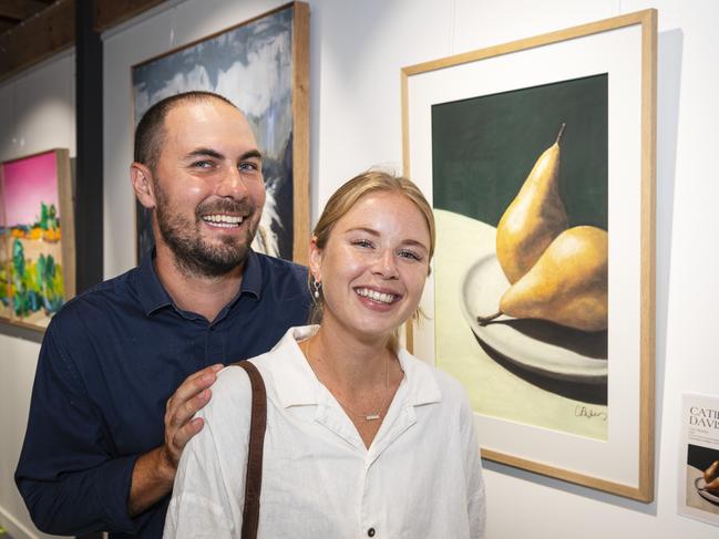 The Next Big Thing finalist Catie Davis with Romey Sullivan and her work The Pears at The Toowoomba Gallery, Friday, March 1, 2024. Picture: Kevin Farmer