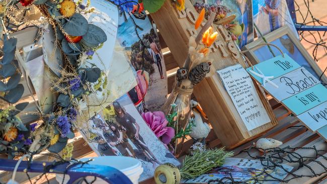 Tributes on a bench seat near the ramp at Seaford. Picture: Russell Millard Photography