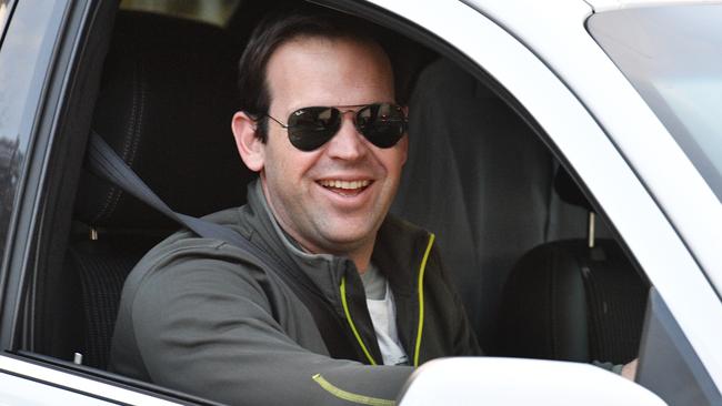 Minister for Resources Matt Canavan flashes a smile as he arrives for the Cabinet dinner. Picture: AAP