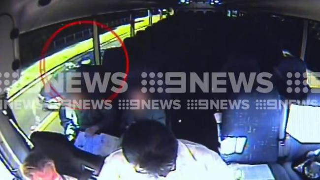 The car in question and adults and children inside the bus. Picture: Channel 9