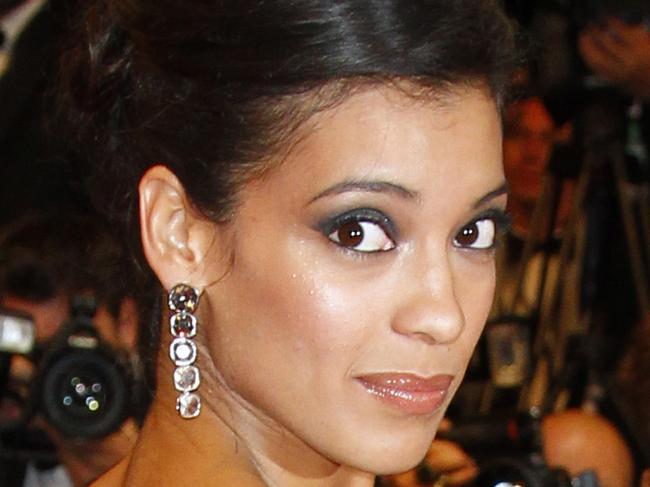 FILE - In this May 13, 2011, file photo, actress Stephanie Sigman arrives for the screening of Polisse at the 64th international film festival, in Cannes, southern France. Sigman, who gained popularity on the 2011 film “Miss Bala”, has been confirmed Tuesday, March 10, 2015, to play the role of Estrella in the upcoming James Bond Movie “Spectre”. (AP Photo/Francois Mori, File)