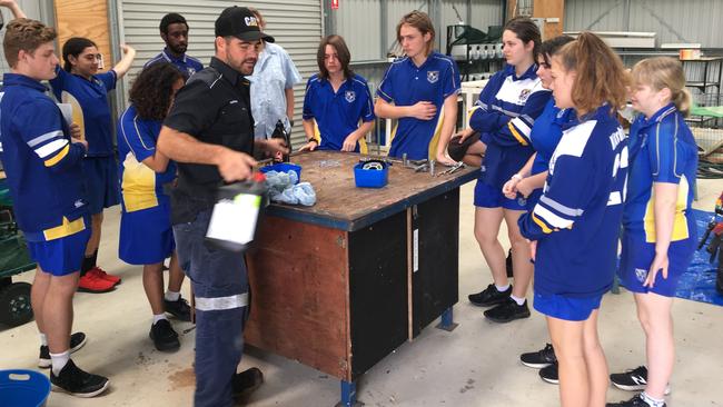 Aussie Tooling Solutions' Nathan Pyle instructing the Year 11 Ag Practices Class in servicing of the walk behind tractor as part of AgriFutures Australia's program. Picture: Contributed